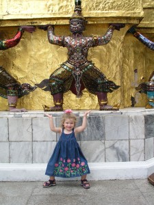Emmy at Wat Phra Kaeo with Ramakien figure